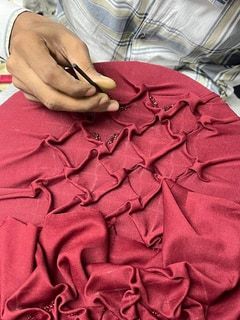 Beadwork inside the smocking